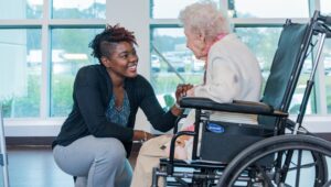 Nurse and Patient talking in the Skilled Nursing facility