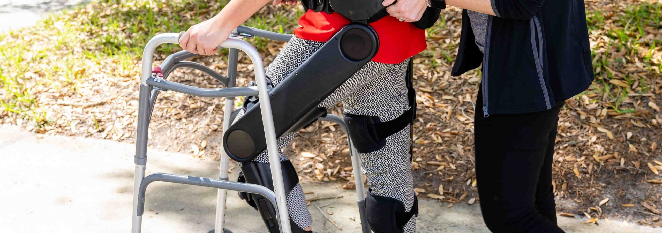 Close up of patient with walker wearing indego