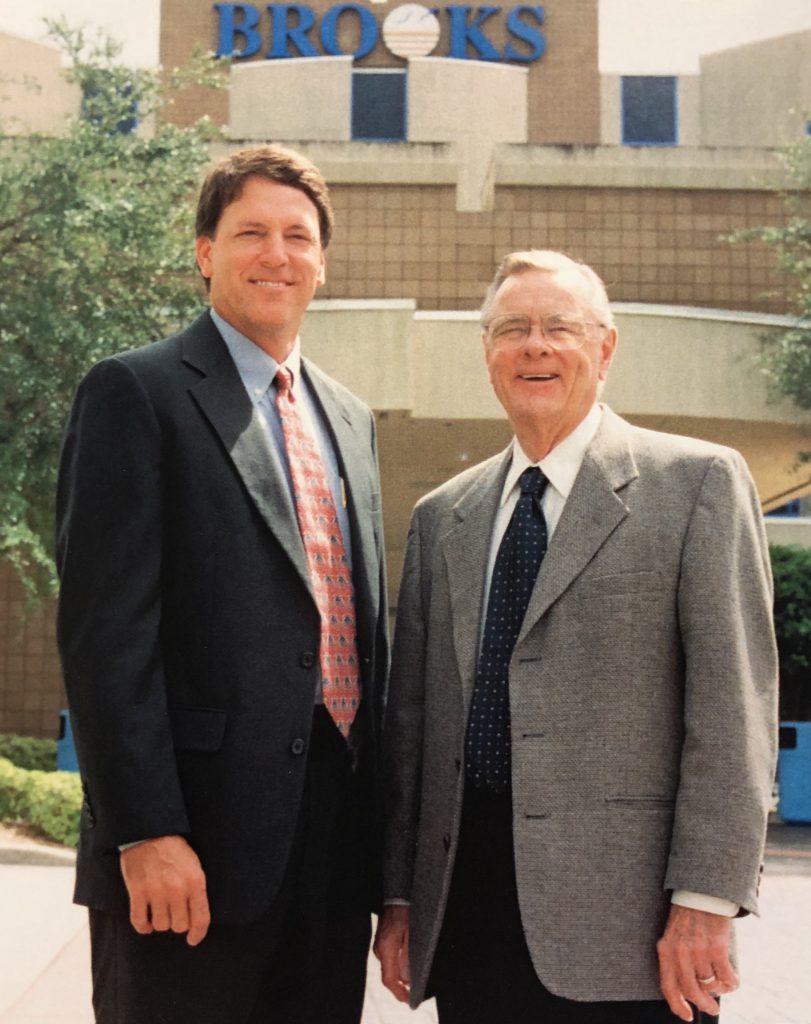 Doug Baer, CEO, with Dr. J. Brooks Brown in front of Brooks hospital