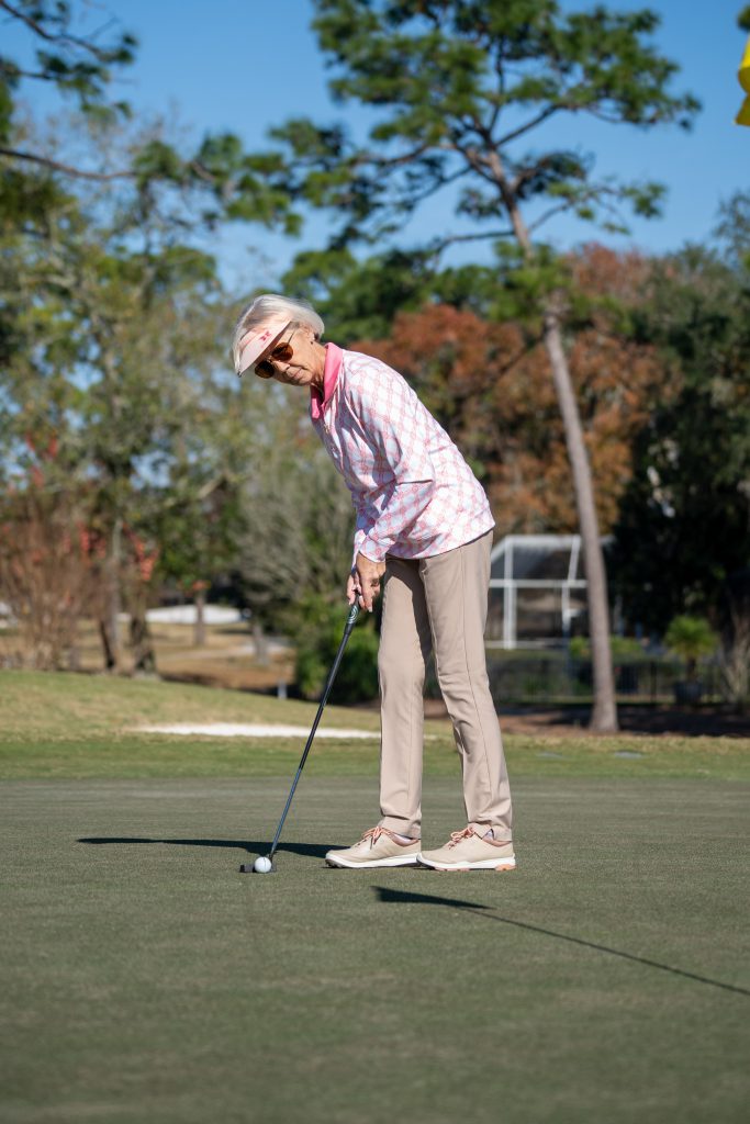 Lynne Sneed golfing