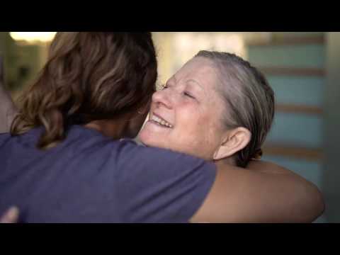 Linda Smith hugs a care provider