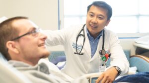 Dr. Ngo speaking with patient