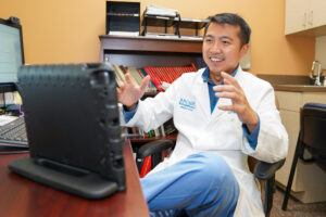 Telehealth doctor talking to a patient online