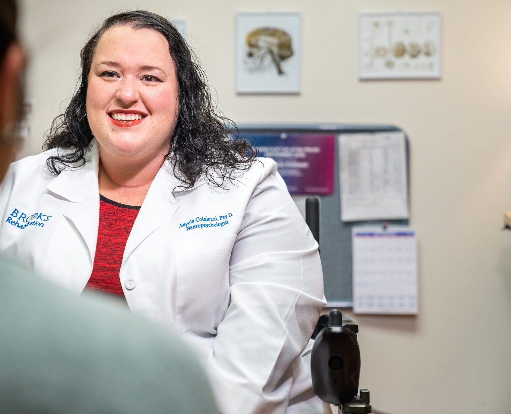 Dr. Colaiezzi talking to patient