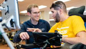 Michael Braun talking to a patient