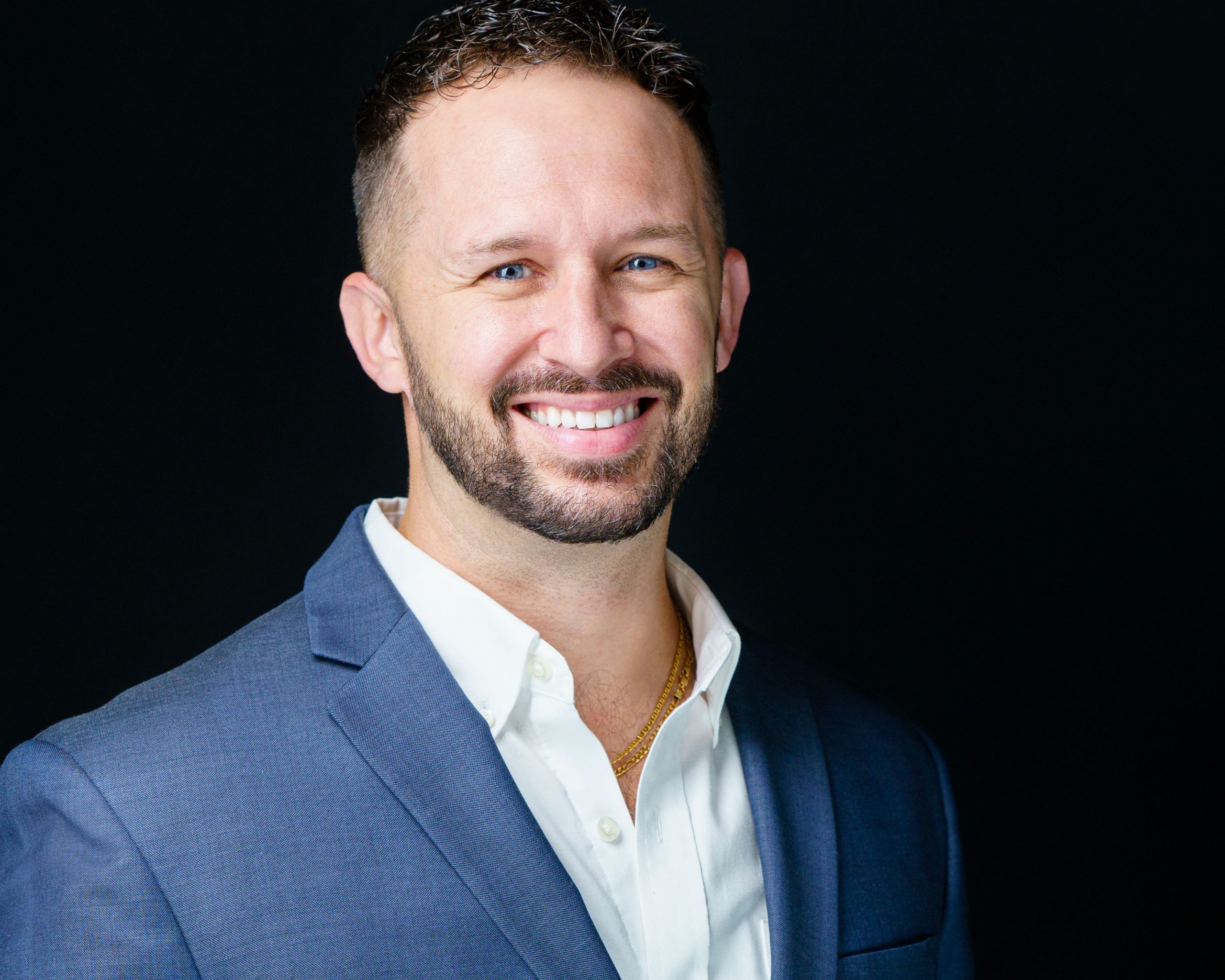 Lou DeMark headshot