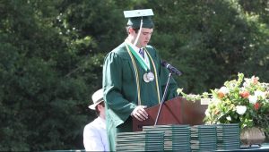 Aden Williams giving a graduation speech