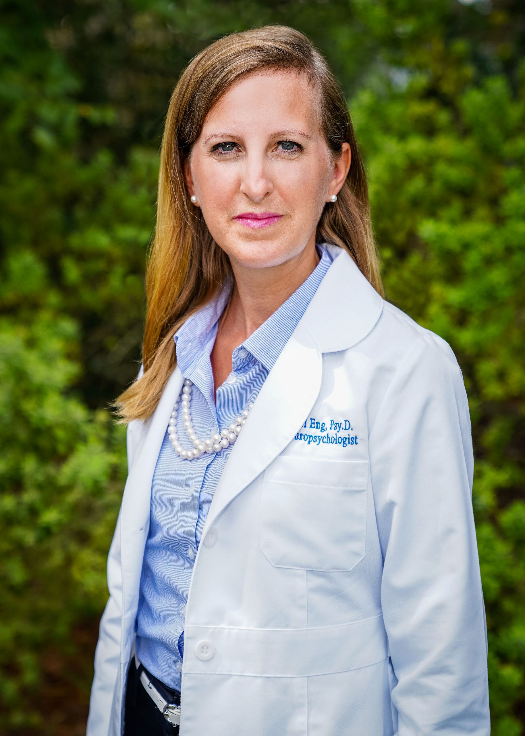 Kari Eng taking a photo outside