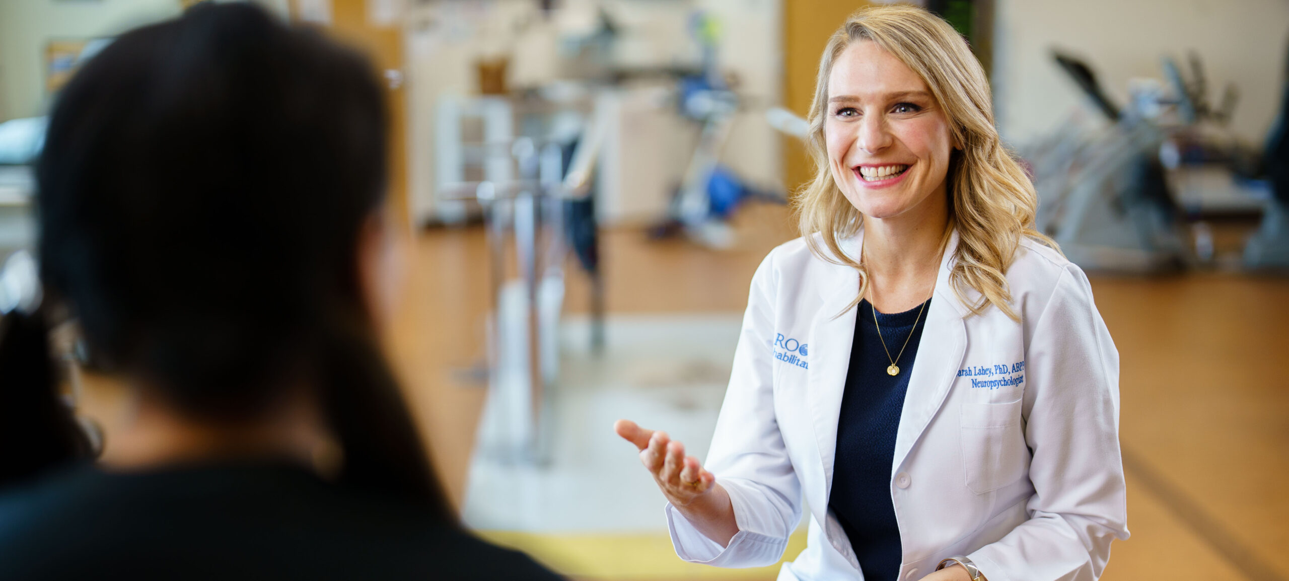 Neuropsychologist giving a consultation inside of Brooks