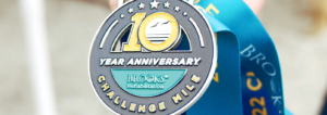 Close up of 10th Year Anniversary Challenge Mile medal