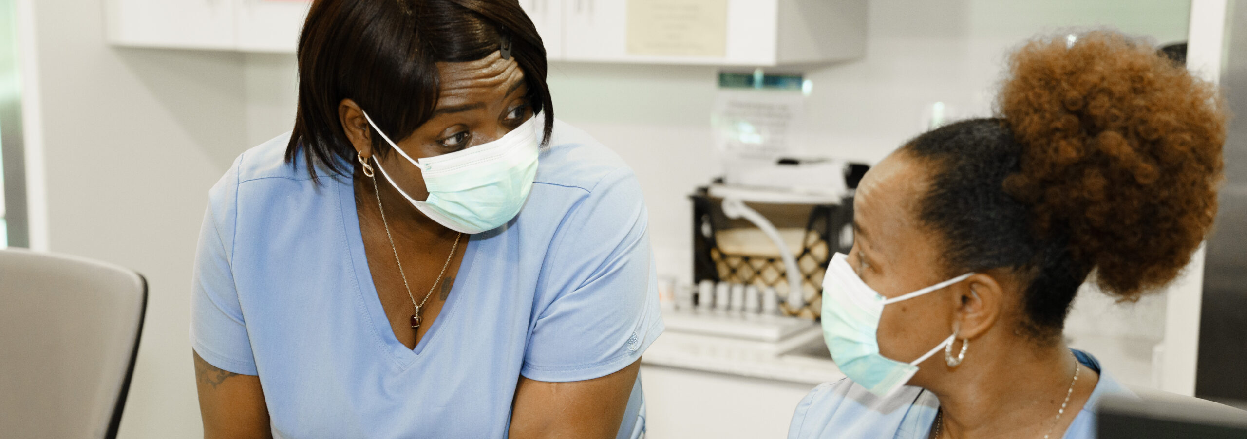 Two nurses having a conversation