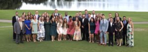 Entire class of Brooks IHL Residency and Fellowship Graduates in front of a fountain