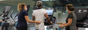 Dorian Rose monitoring a patient on a treadmill