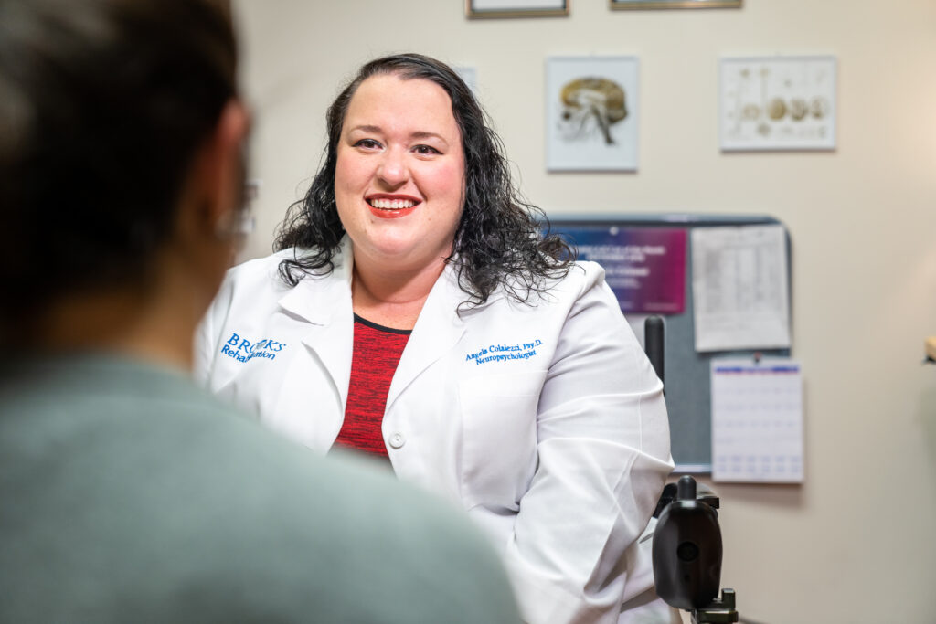 Dr. Colaiezzi talks to a patient