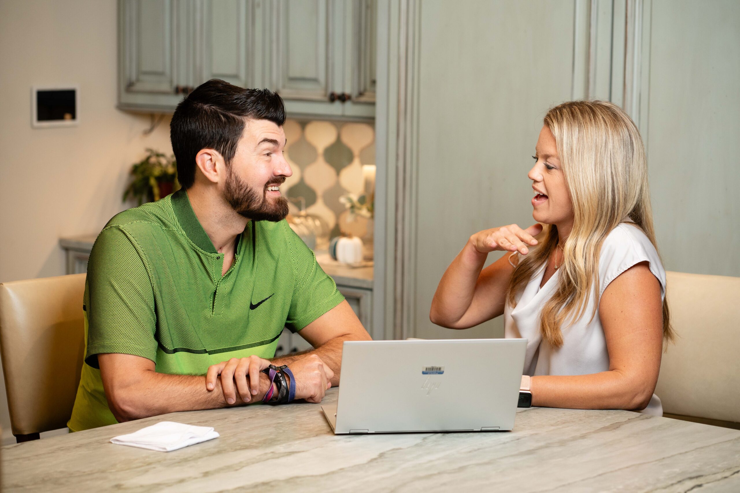 Eric working with speech therapist Jackie Hurst at the dining room table. 