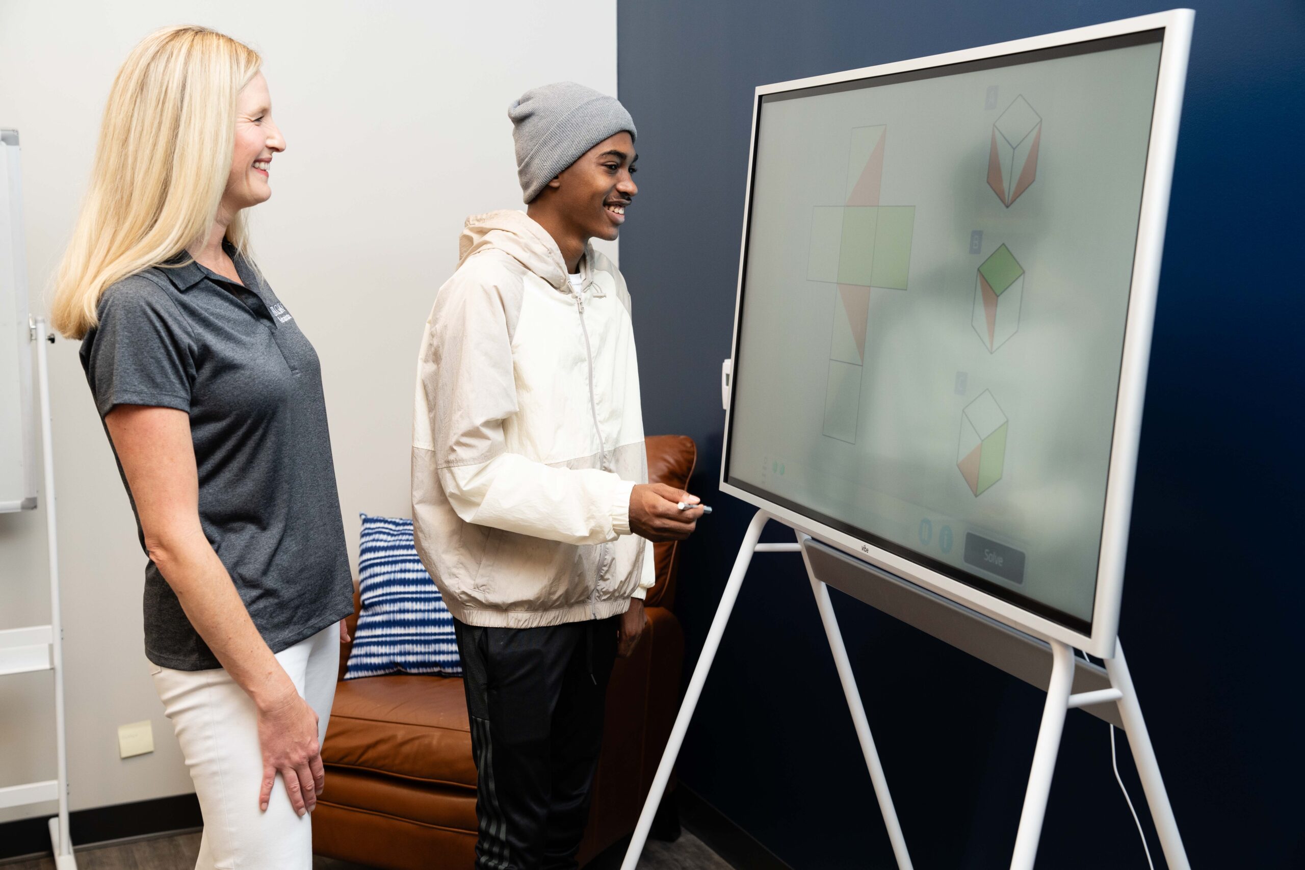 patient in the brain injury day program identifies shapes on a screen. 