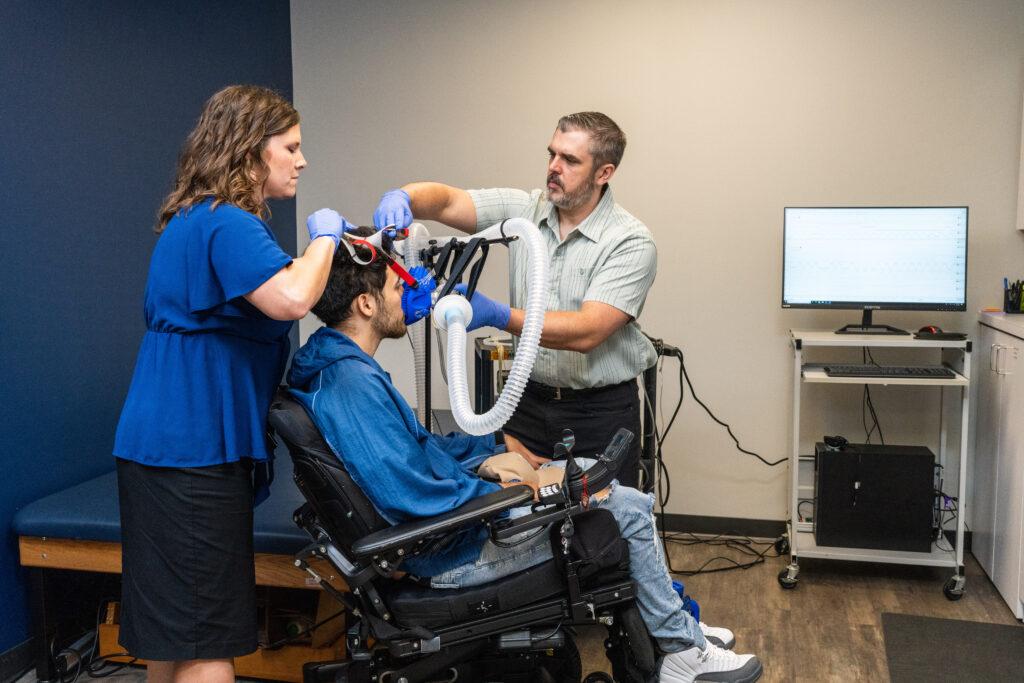 Researchers perform acute intermittent hypoxia on a study participant in the 2024 BioFLO study.