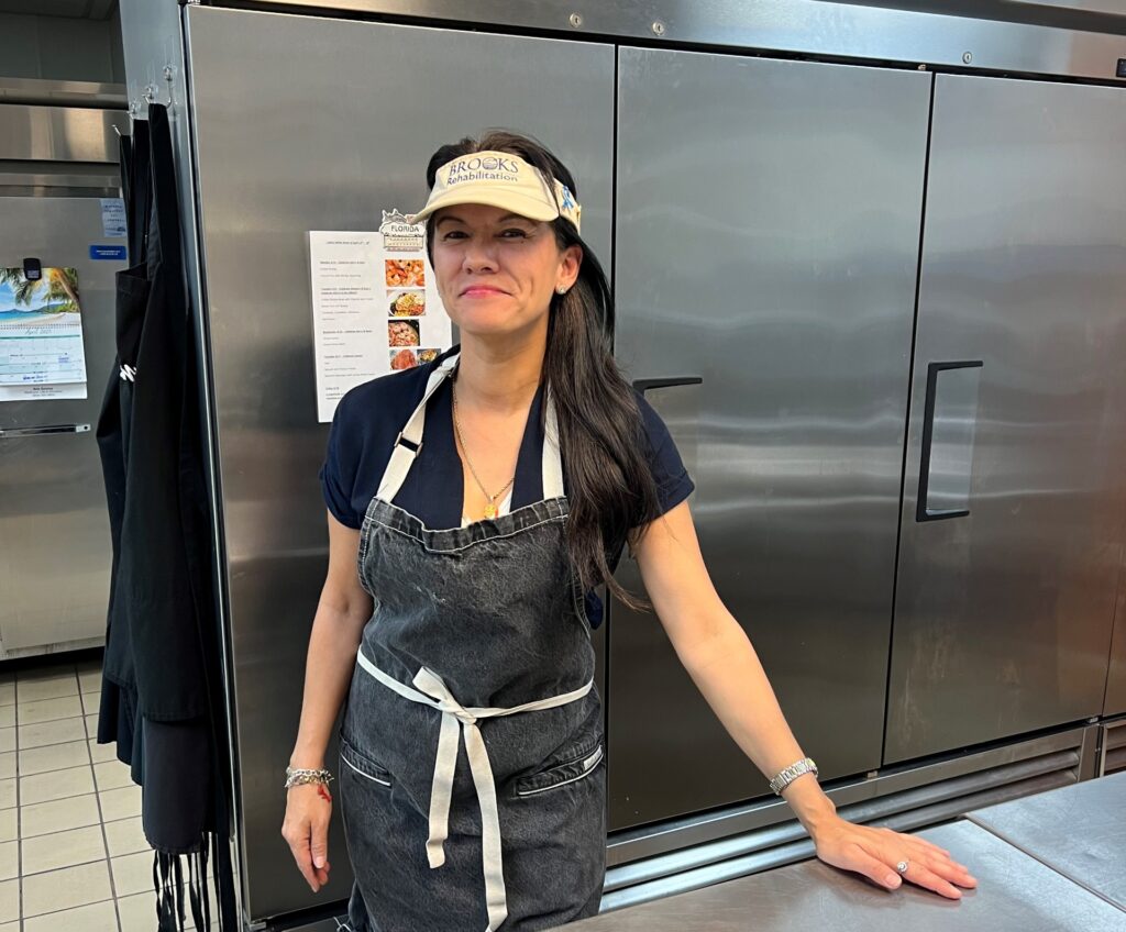 Jennifer Nguy in the kitchen at the Brain Injury Clubhouse.