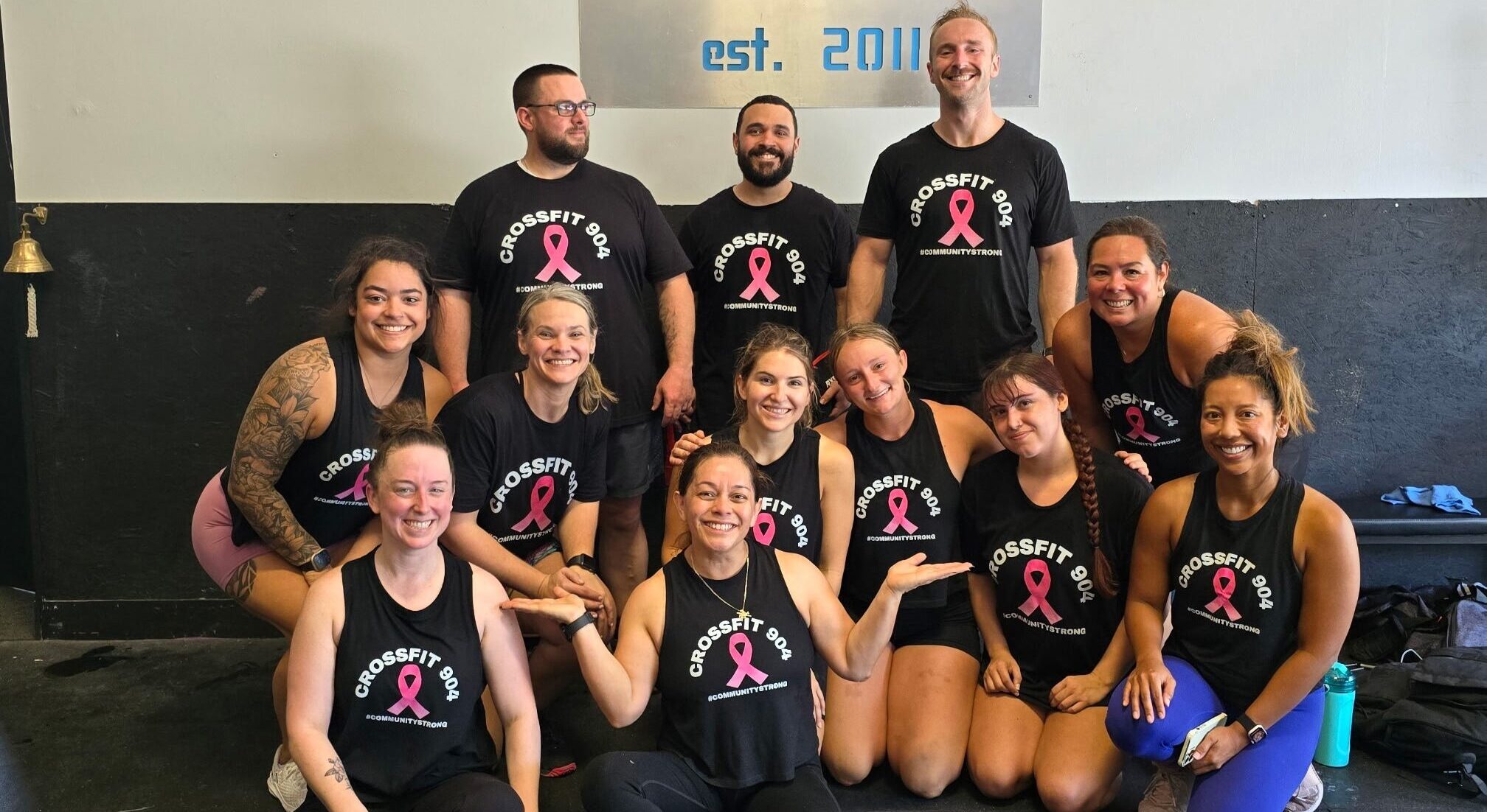 Candy posing with crossfit team