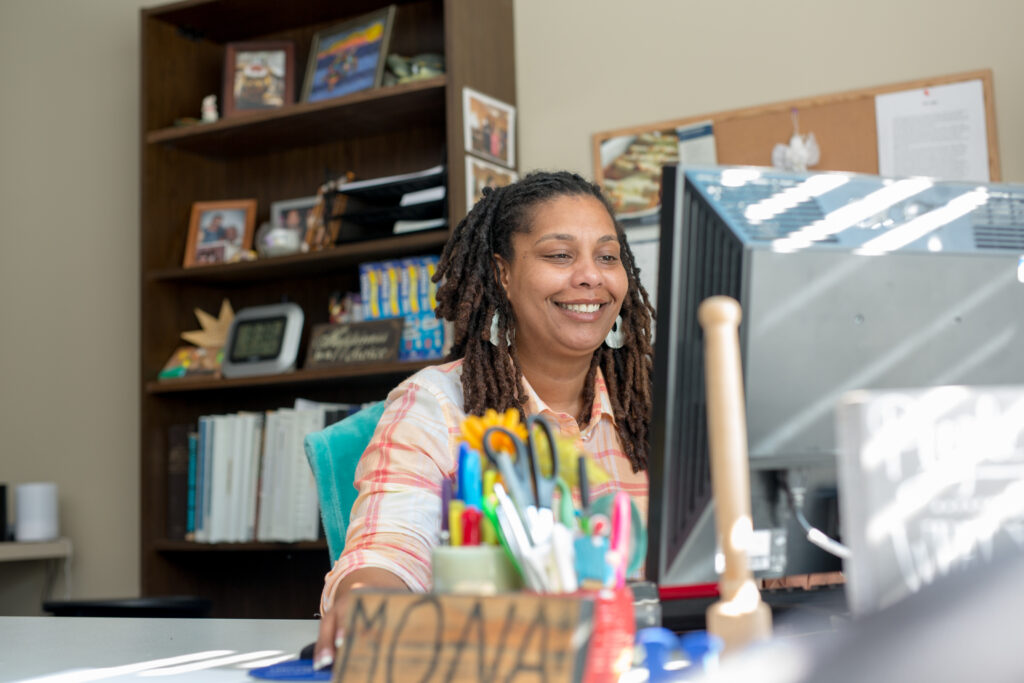A Brooks team member on the computer.