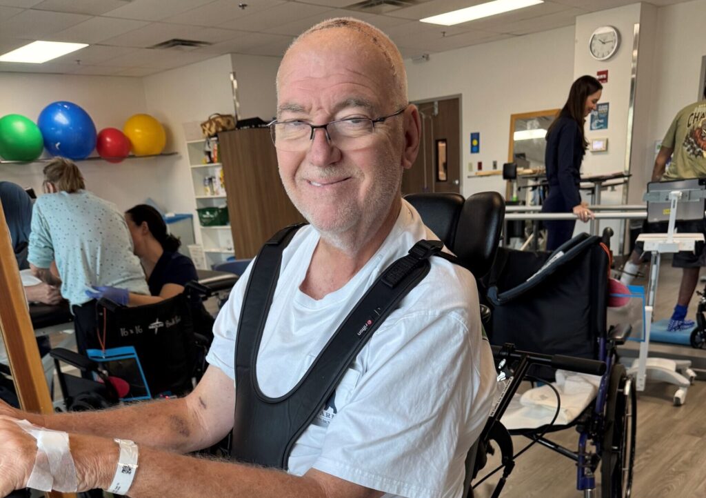 Jon dasher posing in wheel chair