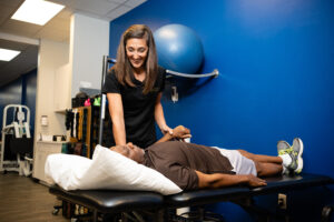 Mallory Behenna working with patient