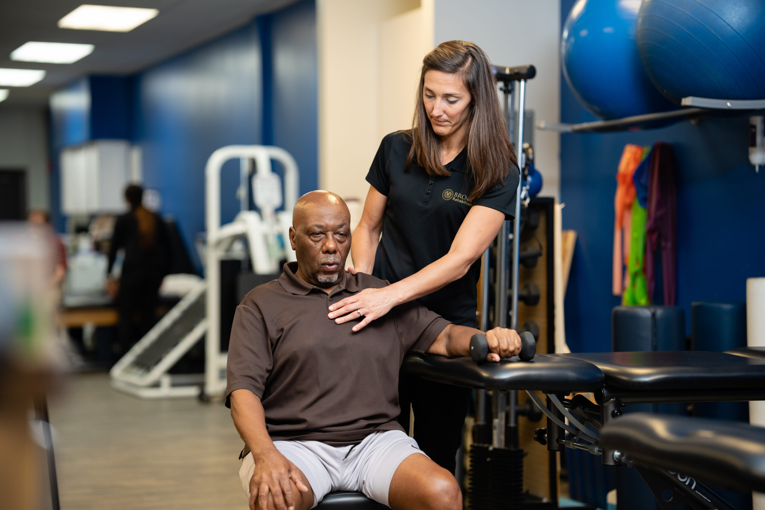 Mallory Behenna working with patient