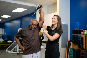 Mallory Behenna working with patient