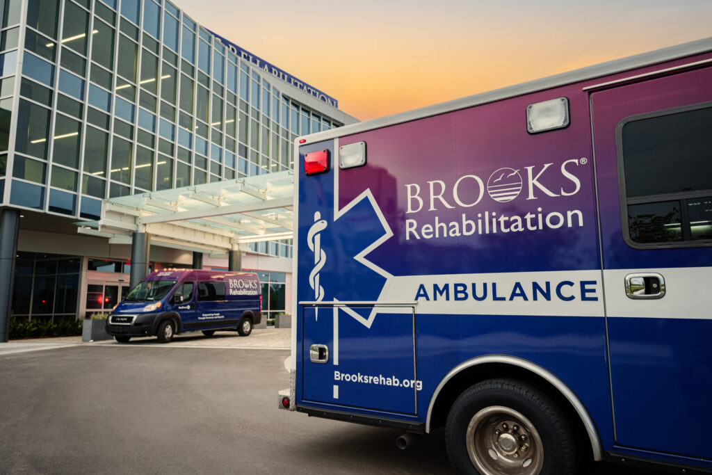 back side of an ambulance in front of Brooks Rehabilitation's Bartram Campus hospital.