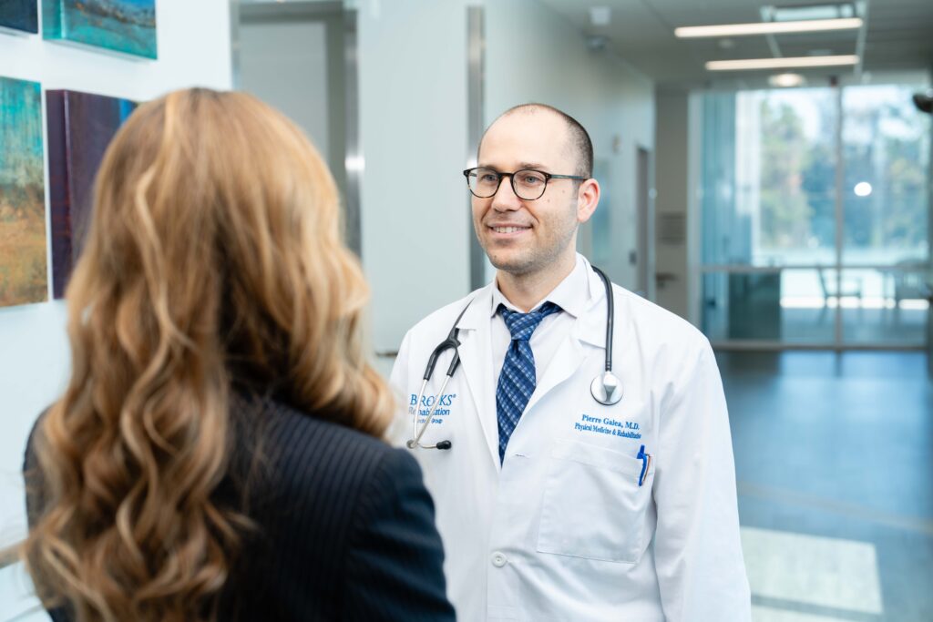 Doctor and researcher consult on transplant program for ensuring top medical care for the transplant program at Brooks.