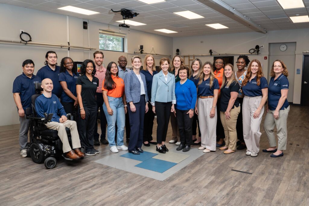 Group shot of many of the investigators and students conducting research at Brooks.