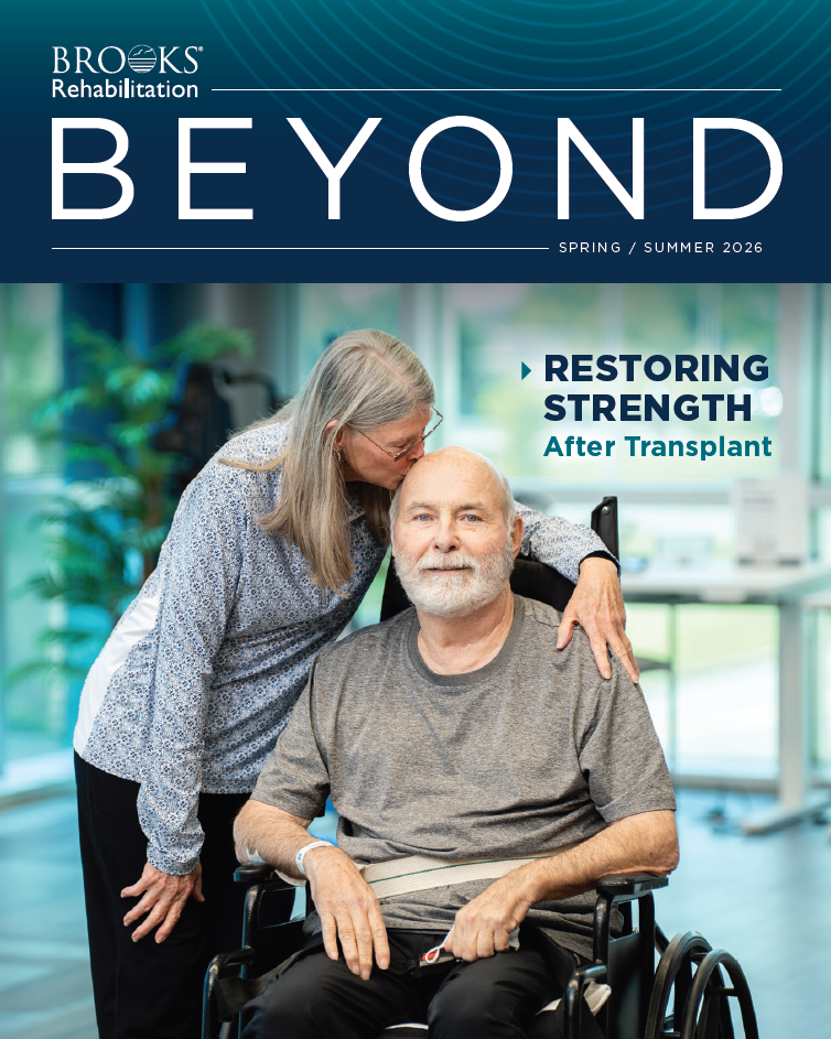 Beyond 2026 Cover - man in wheelchair with woman kissing head